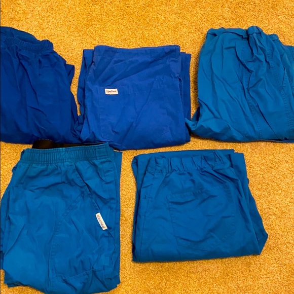 Bundle of scrub pants. - Picture 1 of 6